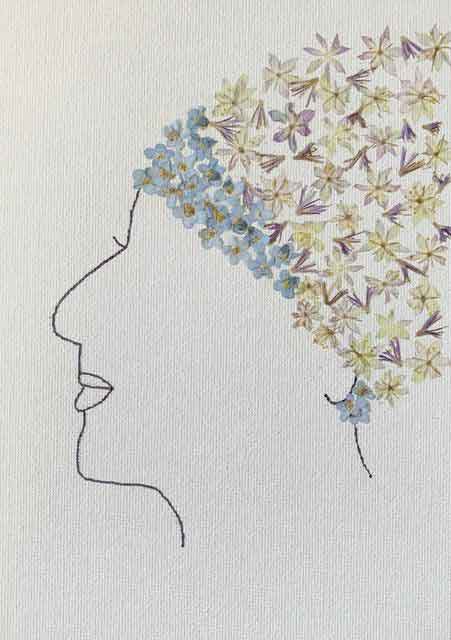 Art created during a 28-day flow challenge exploring the true self. Art shows the profile of a woman with hair made from flower petals
